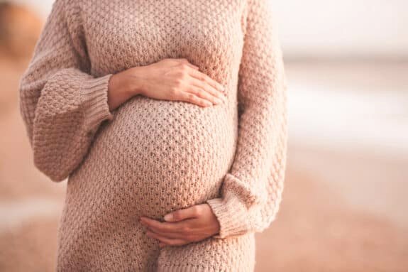 Pregnant woman outdoors