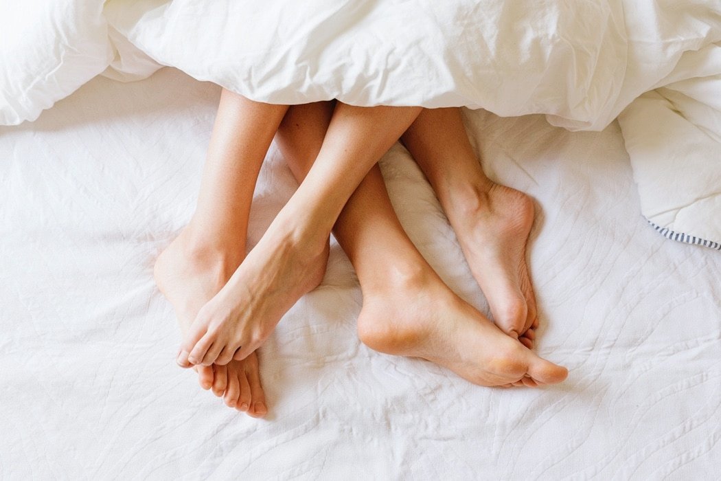 couple feet in bed