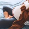 pregnant woman on the couch.